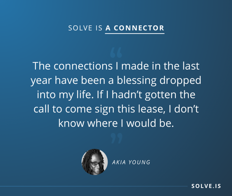 Text on a blue background: "SOLVE IS A CONNECTOR. The connections I made in the last year have been a blessing dropped into my life. If I hadn’t gotten the call to come sign this lease, I don’t know where I would be." Below the text is a small black and white circular photo of a person with "AKIA YOUNG" written beside it. At the bottom right corner, “SOLVE.IS” is displayed.